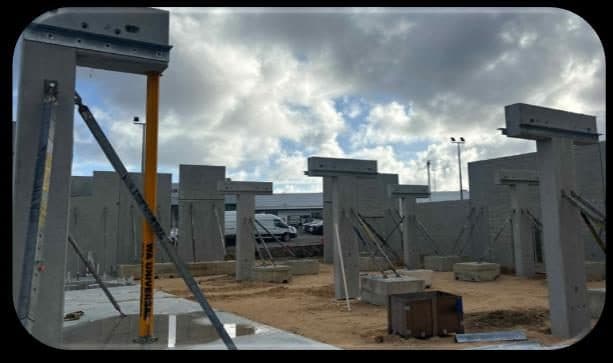 Monolithic precast column and headstock units erected on site